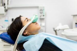Woman receiving nitrous oxide at the dentist.